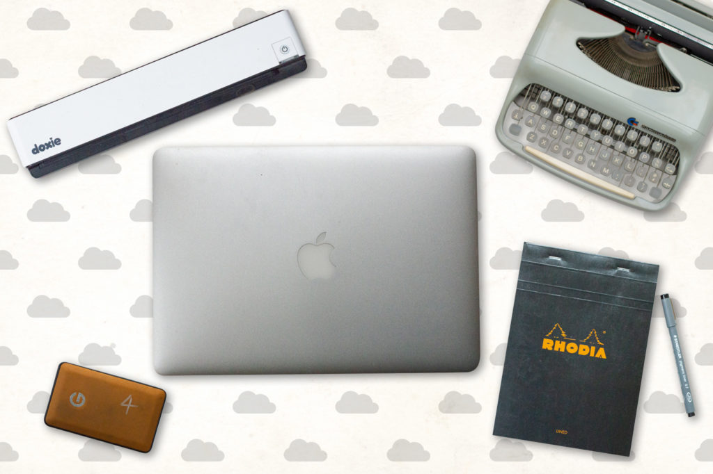 doxie scanner, macbook air, hard drive, typewriter, note pad, pen